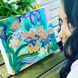 Florals Canvas in outdoor setting with face in picture for scale